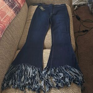 NEVER WORN Dark wash high waisted jeans with fringed bottom
